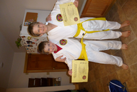 Jonathan and Noah with their yellow belts.